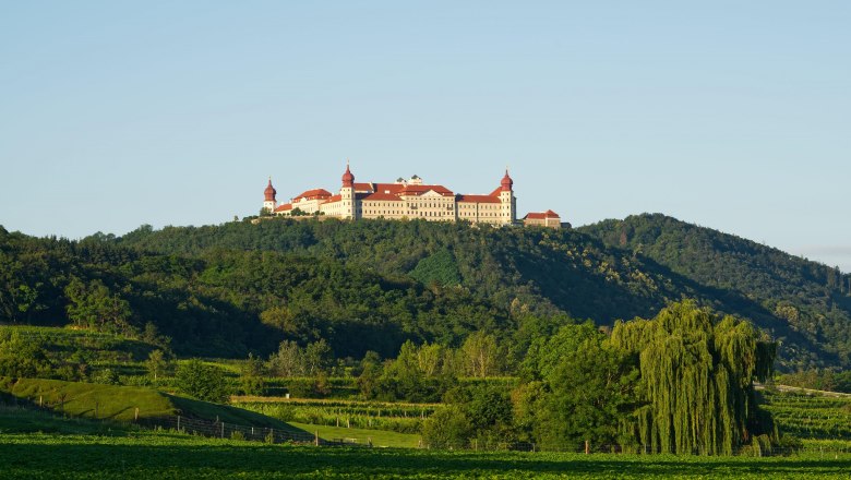 Göttweig Benedictine Abbey, © Frater Andreas Remler OSB Göttweig Benedictine Abbey on a hill with a green landscape in the foreground.