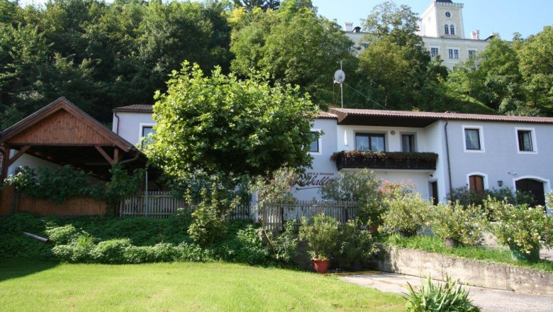 Exterior view with garden, © Fam. Rethaller Exterior view of a house with garden and trees in the background.